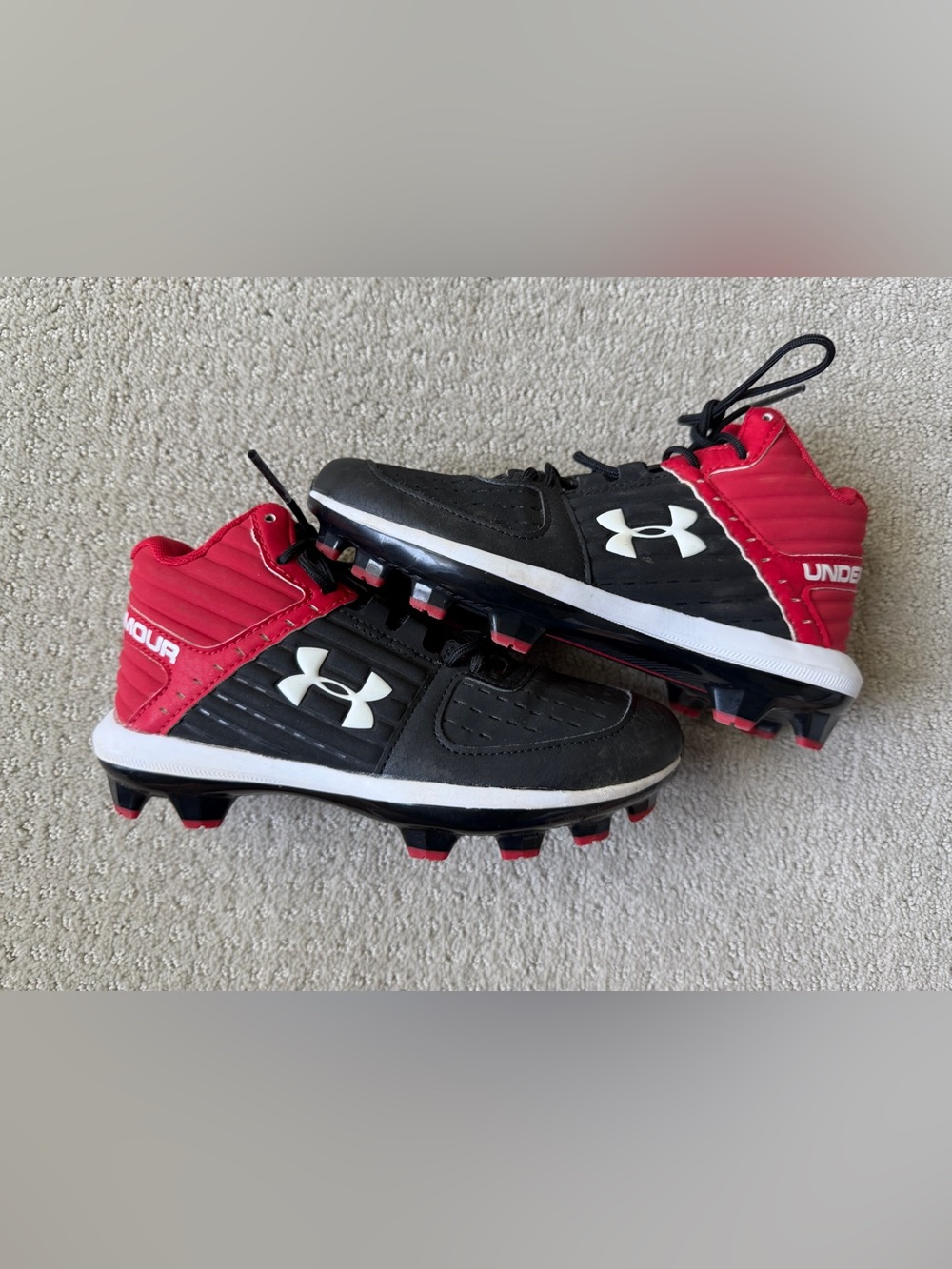 Under Armour Kids Black and Red Cleats